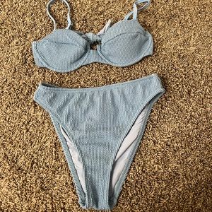 Brand new- never worn high waist bikini. Adjustable straps and tie back. Size- S